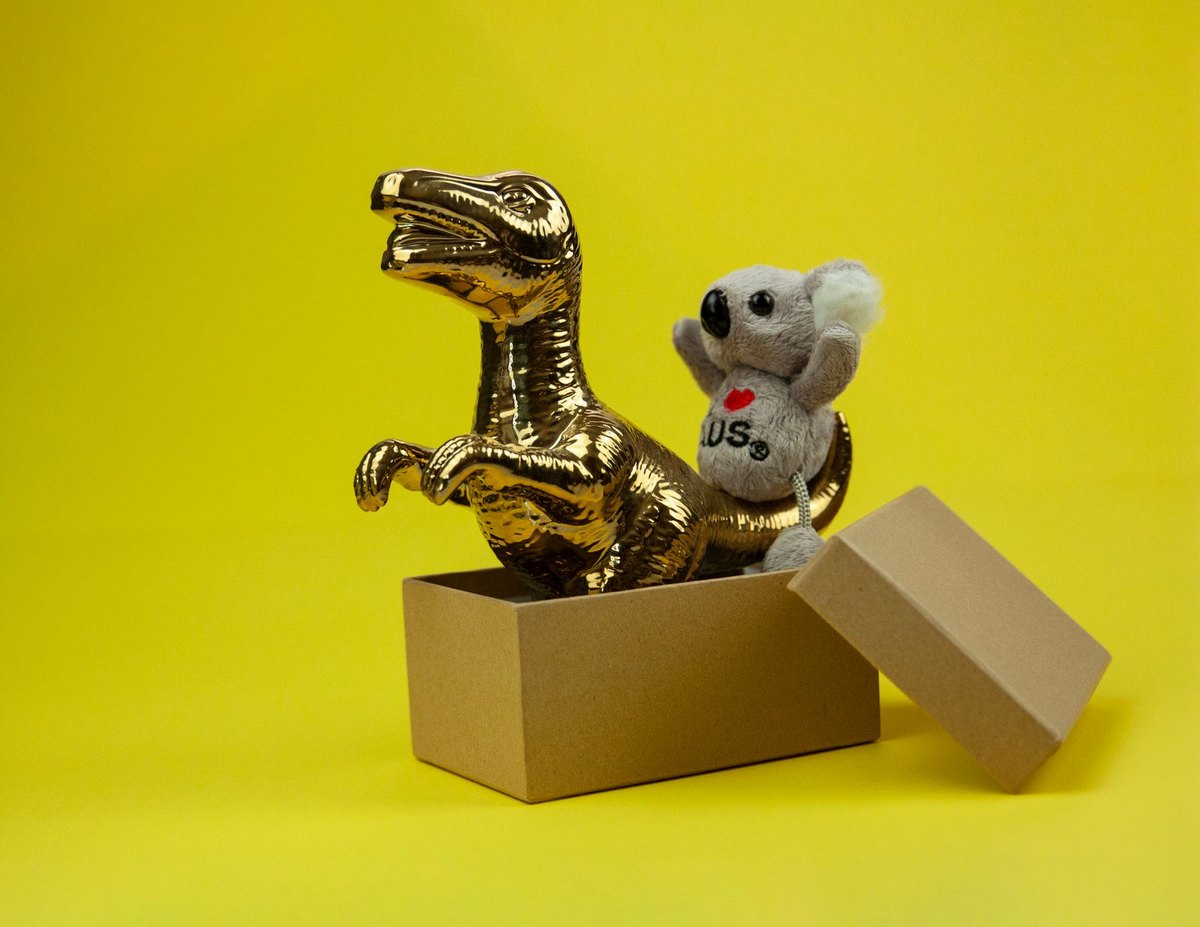 Collectible figures in branded packaging — authenticity is checked by the box